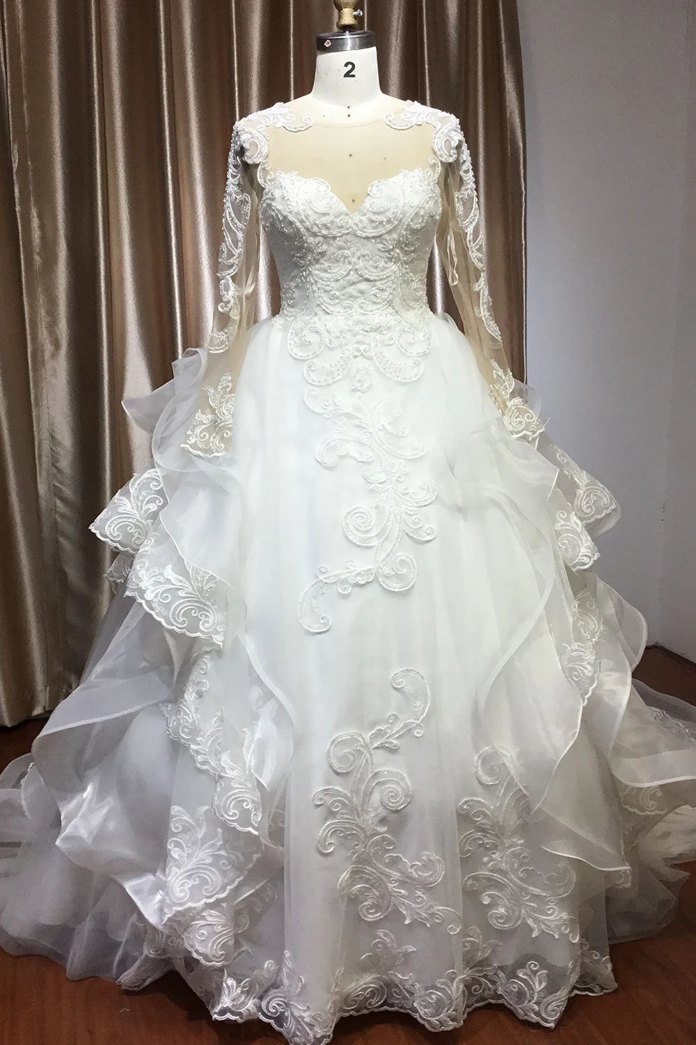 Long Sleeve Ruffles Ball Gown Wedding Dress With Lace Appliques