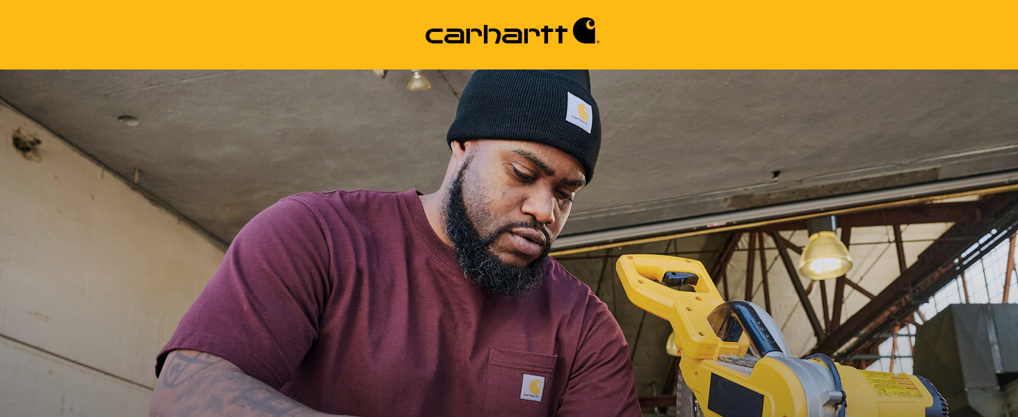 Carhartt, Image of man wearing black beanie and maroon pocket tee working with power tools