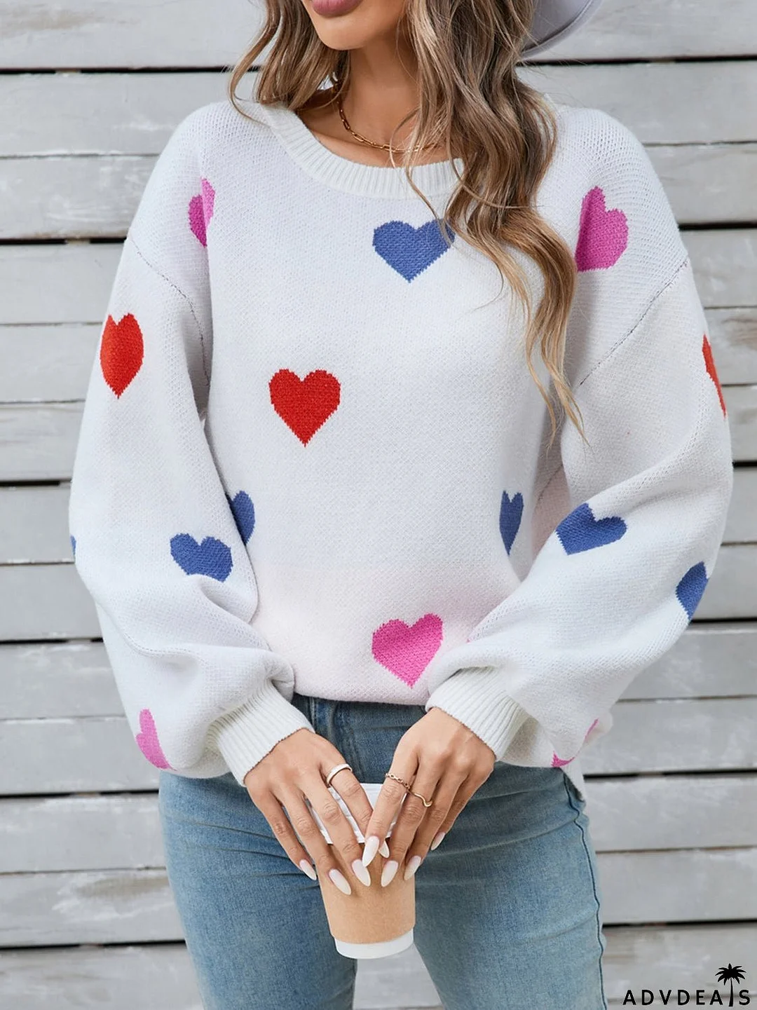 Heart-shaped, long-sleeved crew neck sweater