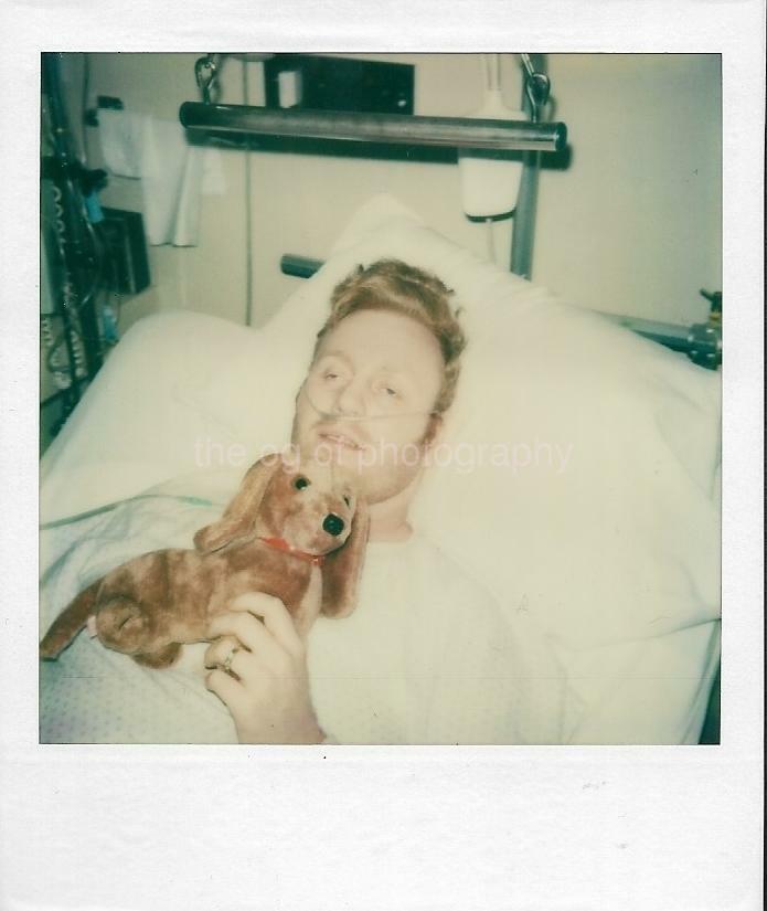 STUFFED DOG GUY Vintage MAN Hospital POLAROID Found Photo Poster painting COLOR Animal 21 48 R