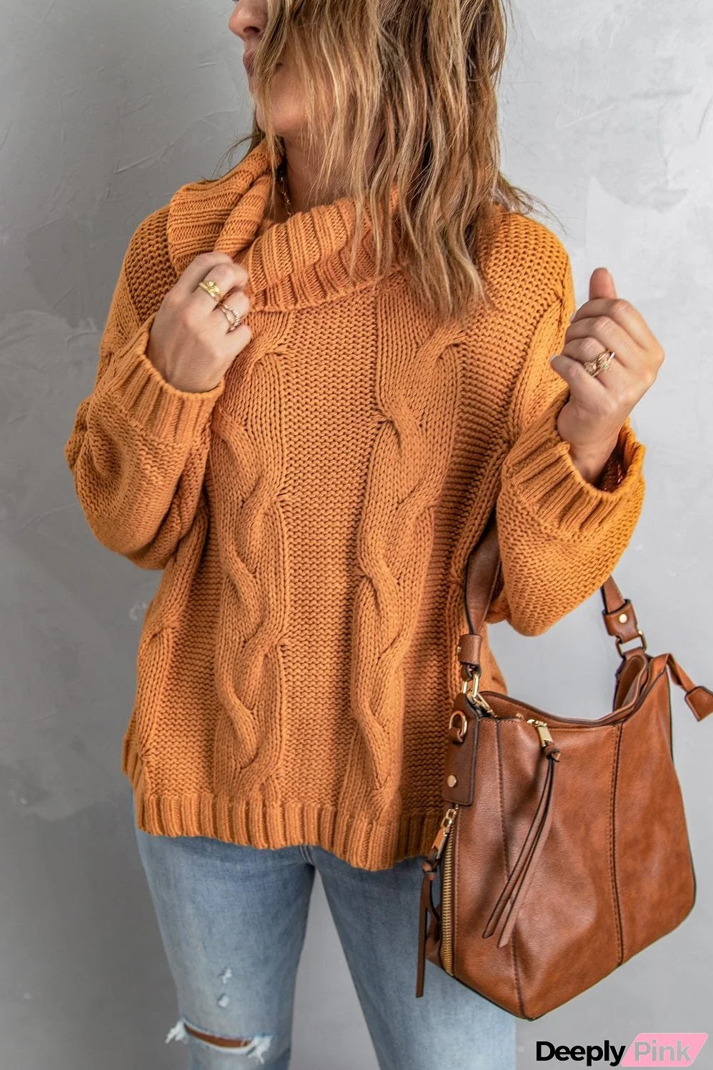 Oversized Knit Sweater with Cable Detail