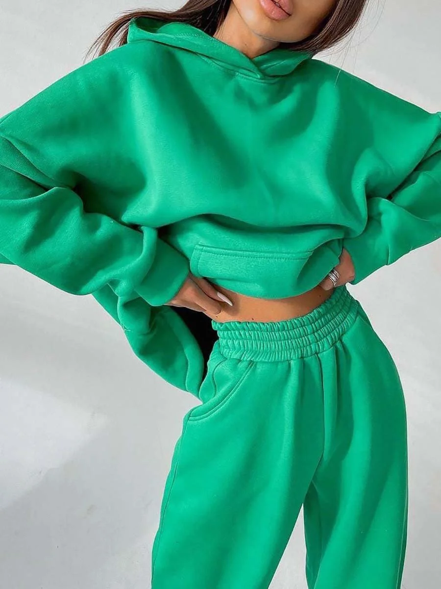 Two-piece suit of solid color hoodie with pockets and sweatpants