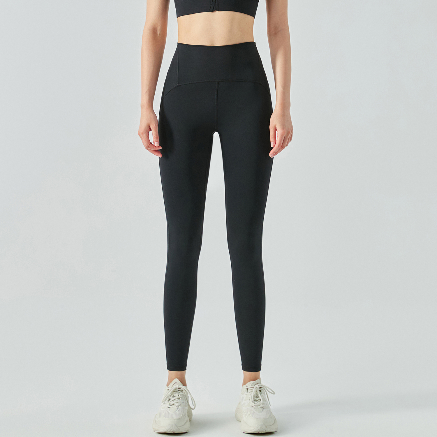 Buy women's high rise traceless naked feeling tummy control slimming waist nylon gym capri leggings of high quality on Hergymclothing Black
