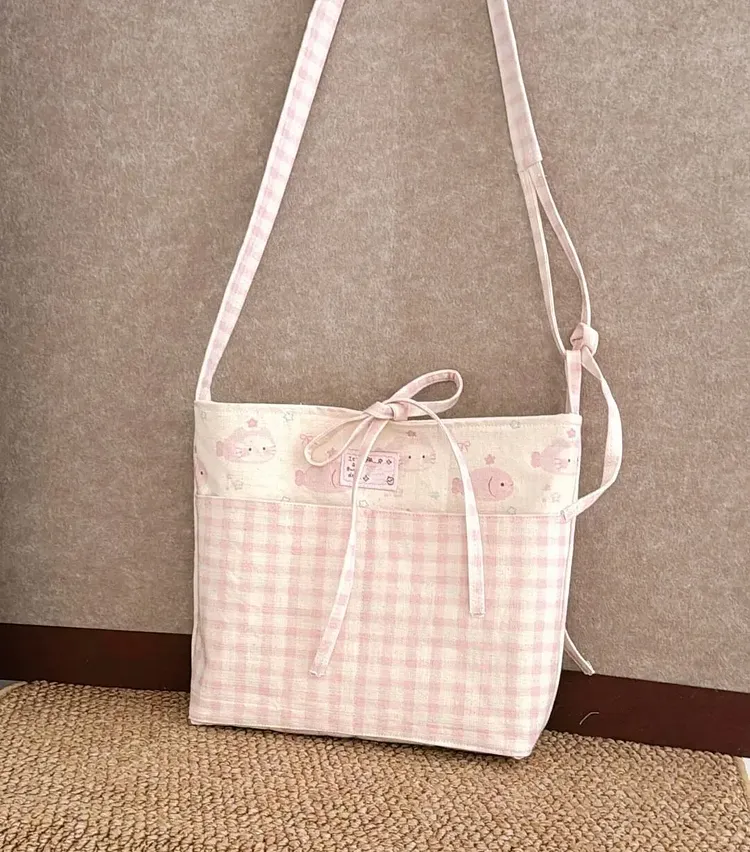 Pink plaid shoulder bag