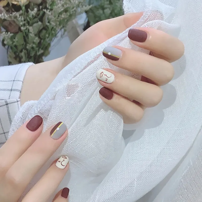 24PCS/box Fashionable Blue and Graffiti Pattern Wearable Fake Nails press on Short oval Head Lady Full Cover Finished Fingernail-Nail Inspo