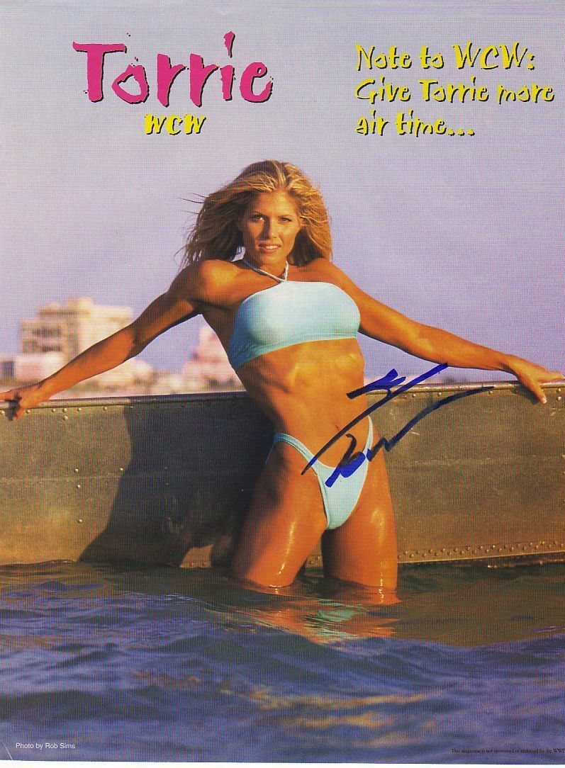 WWE WWF TORRIE WILSON SEXY AUTOGRAPHED HAND SIGNED 8X10 Photo Poster painting WRESTLING PICTURE