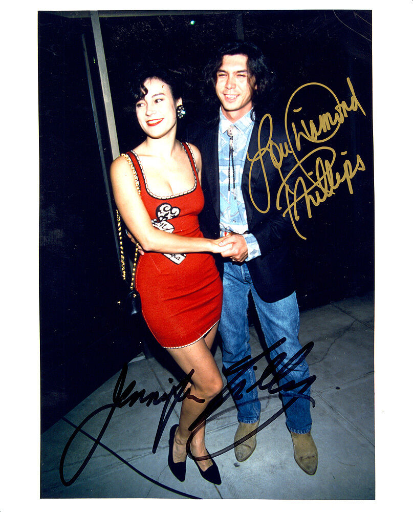 JENNIFER TILLY & LOU DIAMOND PHILLIPS GOLD SIG. SIGNED 8X10 WITH COA