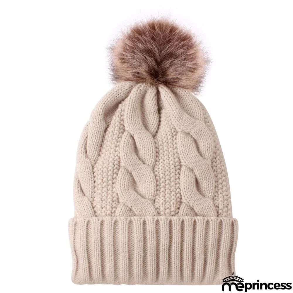 Knitted hat with plush padded fur ball