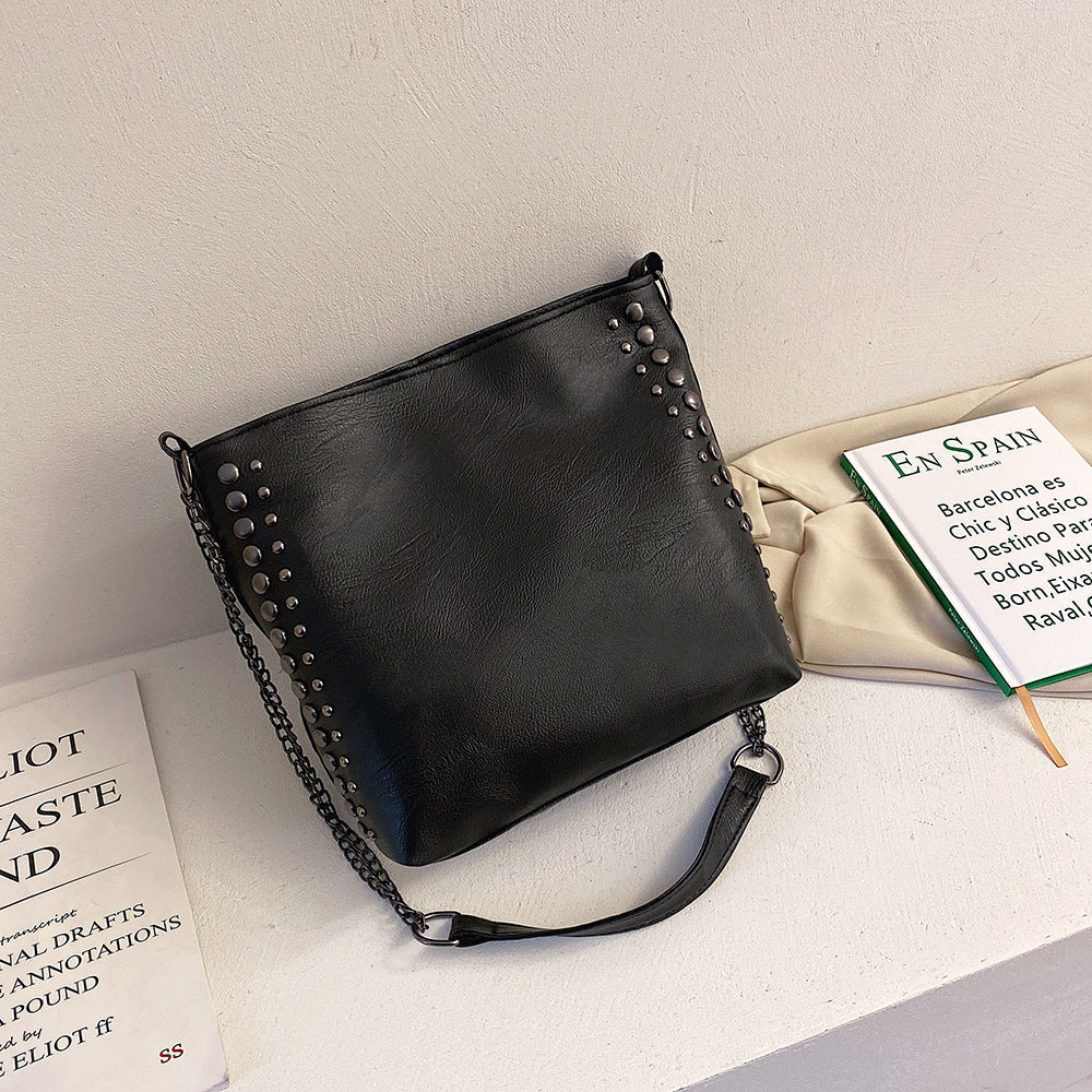 Winter new female bag retro style large capacity one-shoulder bucket bag soft leather rivet messenger bag