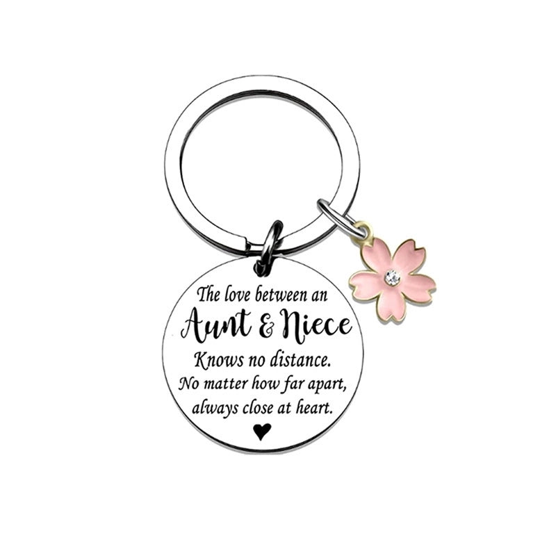 Casual Minimalist Letter Flower 304 Stainless Steel Iron Polishing Plating Laser White Gold Plated Bag Pendant Memorial Keychains