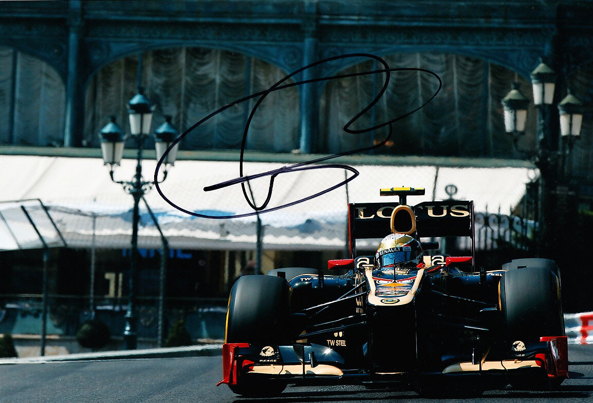 Romain Grosjean Hand Signed F1 2012 Lotus-Renault Photo Poster painting 12x8 7.