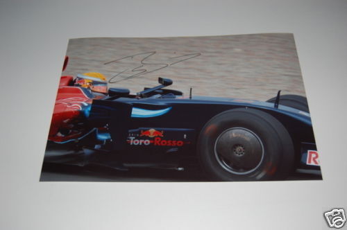 Toro Rosso F1 Photo Poster painting signed by Sebastien Buemi.