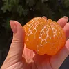 Hand-carved orange shape from pure natural jade - a collectible item