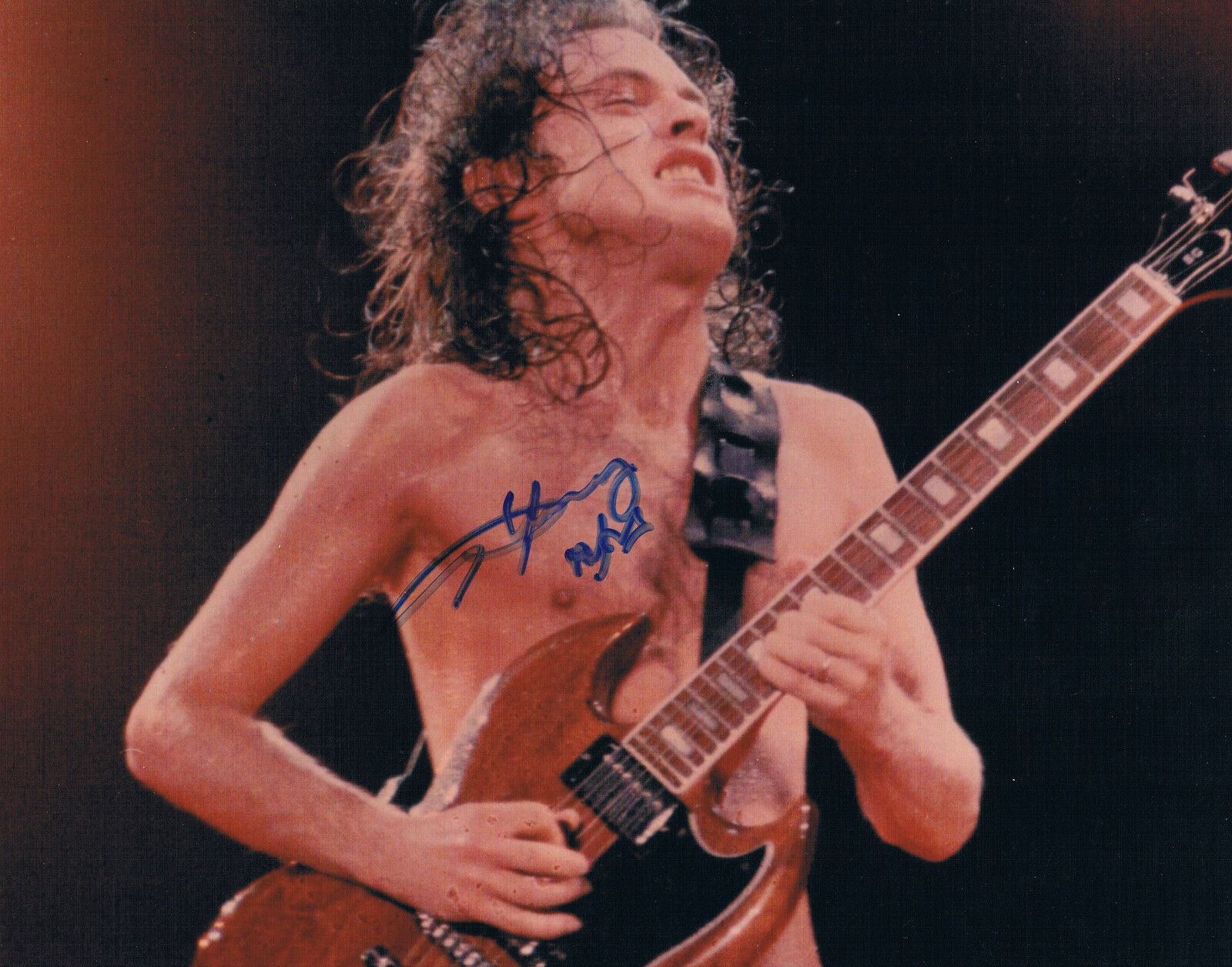 AC/DC Angus Young 1955- genuine autograph Photo Poster painting 8x12