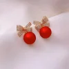 Boucles d'oreilles de no&euml;l en zircon brillant, n&oelig;ud boule rouge