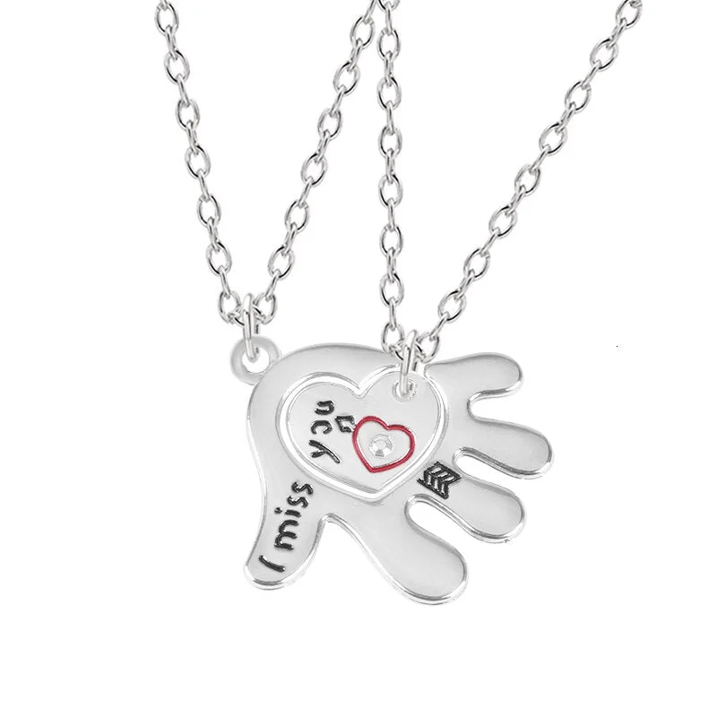 Buzzdaisy Good Friend Series Palm Heart-shaped Hollow Carved Red Character Pendant
