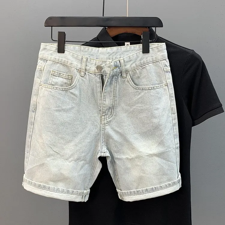 Men's denim shorts with a slim fit designed in five inch length for casual