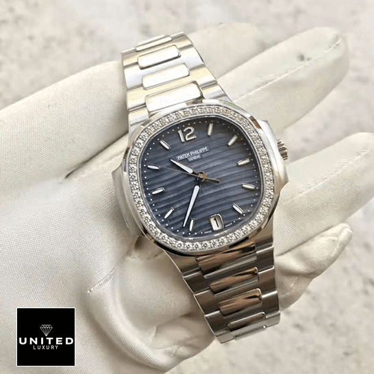 Patek Philippe Diamond Bezel Blue Dial Steel Bracelet Replica on the white glove hand