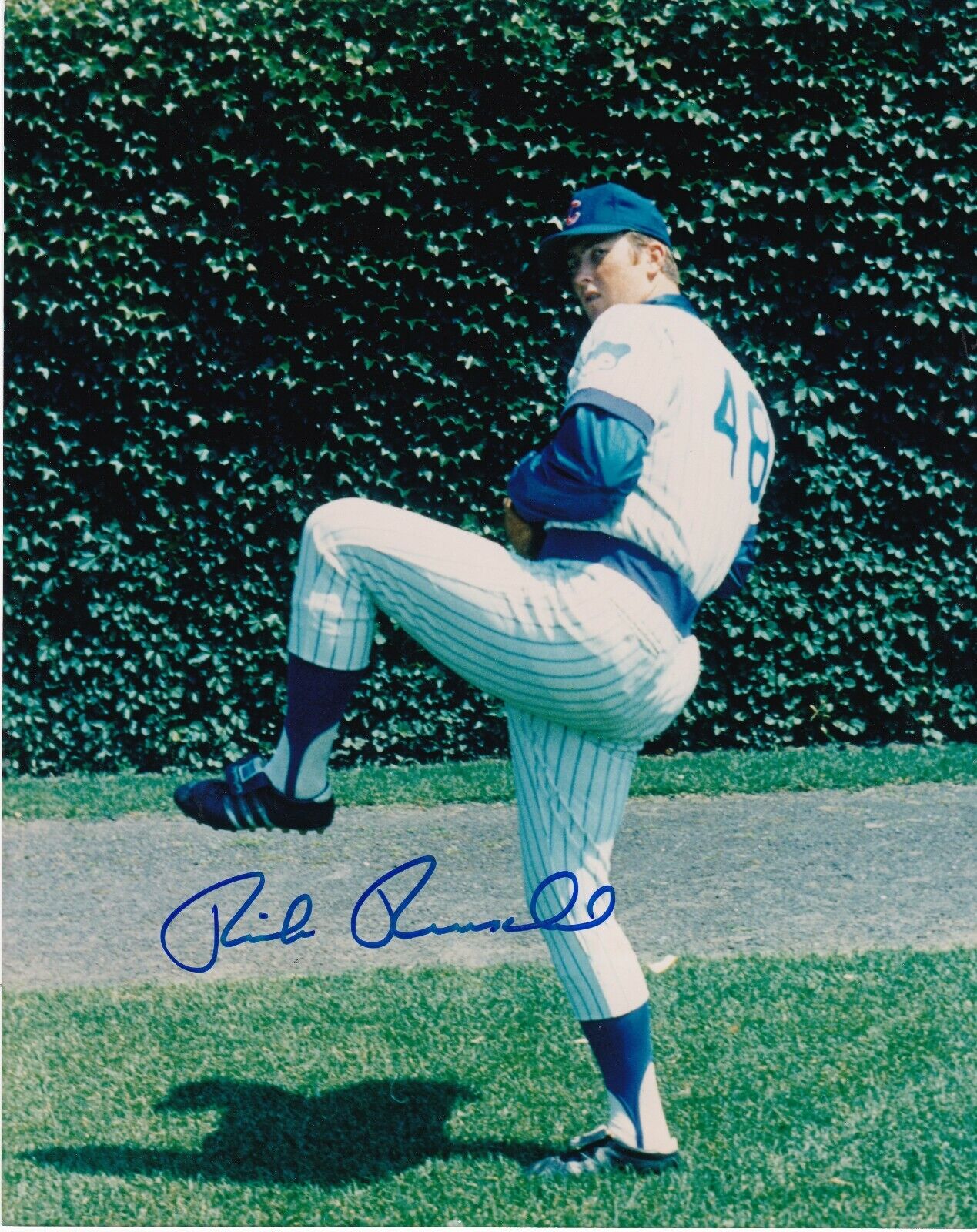 RICK REUSCHEL CHICAGO CUBS ACTION SIGNED 8x10