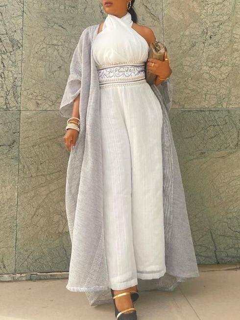 Halter white jumpsuit and outerwear set فساتين