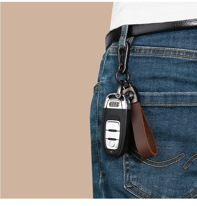 🔥Hot sale🔥Exclusive logo🔥Car anti-lost genuine leather alloy keychain