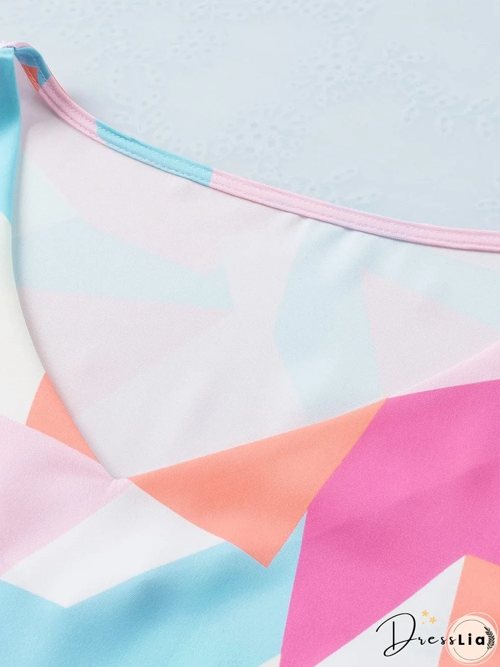 Pastel Geometric Print V-Neck Cap Sleeve Top with Colorblock Detail