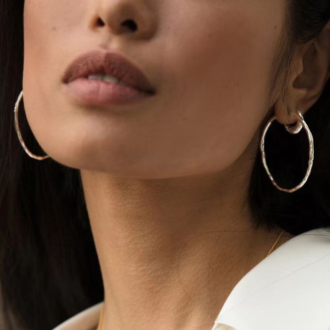 Muse sterling silver earrings styled with an elegant evening dress