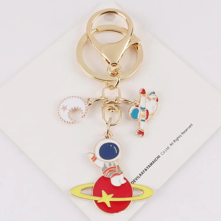 Cartoon Spaceman Flying Saucer Keychain