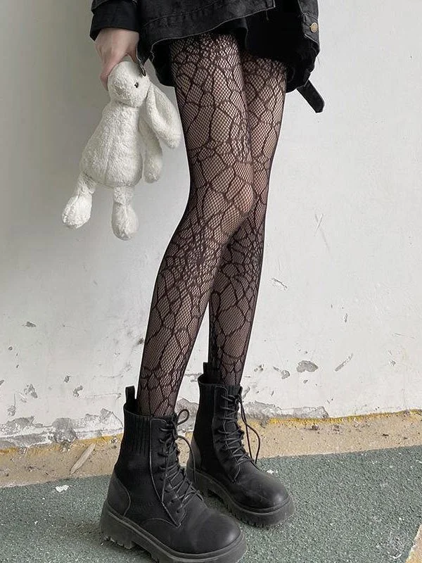 Brownm tights with a spider web pattern