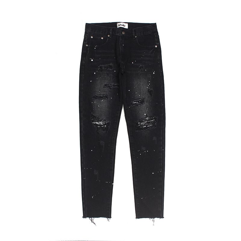 Raw-edge appliquéd cashew flower splattered straight ripped black jeans
