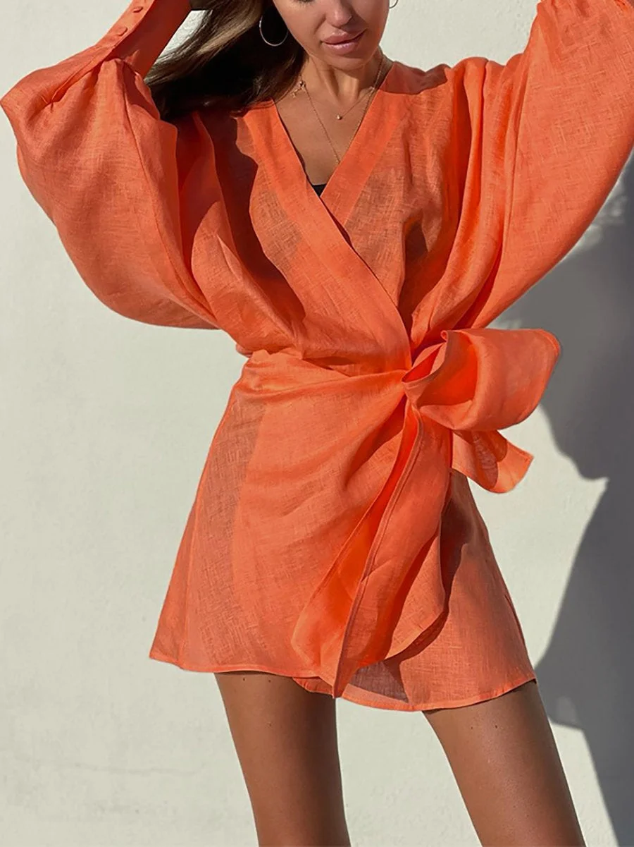 Irregular mini dress with long sleeves