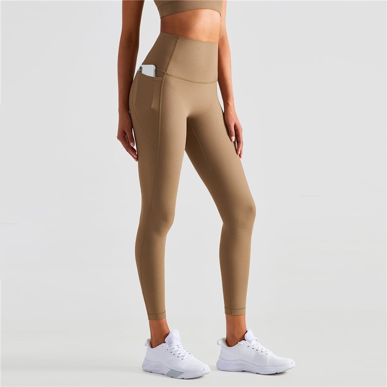 Buy different types of no front seam bubble butt ribbed sports leggings with big side pockets on Hergymclothing deep khaki