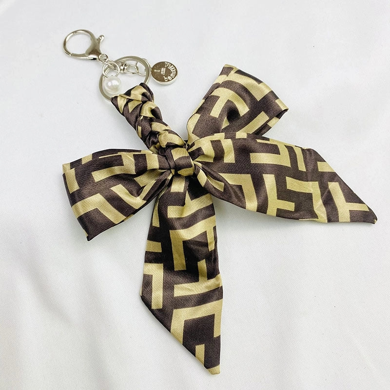 Sweet Minimalist Bow Knot Cloth Metal Unisex Bag Pendant Keychain