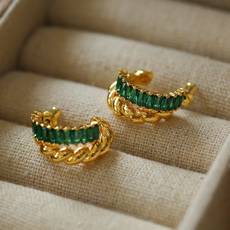 Lightweight twisted zircon hoop earrings in natural lighting
