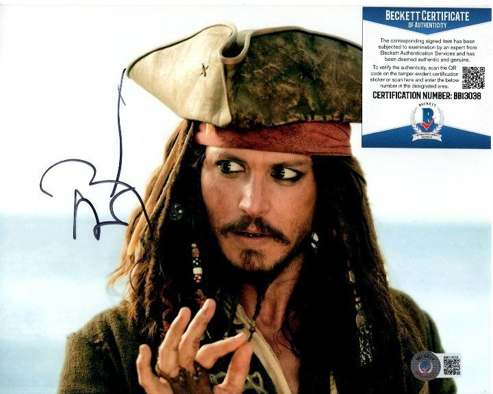 JOHNNY DEPP signed 8x10 PIRATES OF THE CARIBBEAN JACK SPARROW Photo Poster painting Beckett BAS