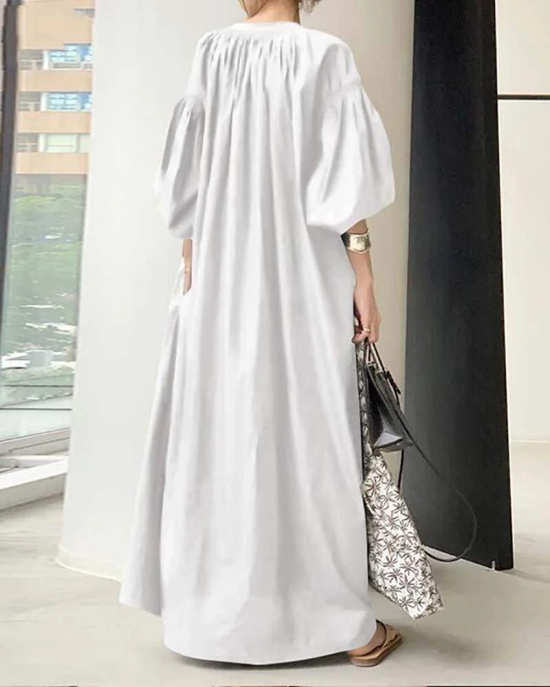 Loose dress with balloon sleeves
