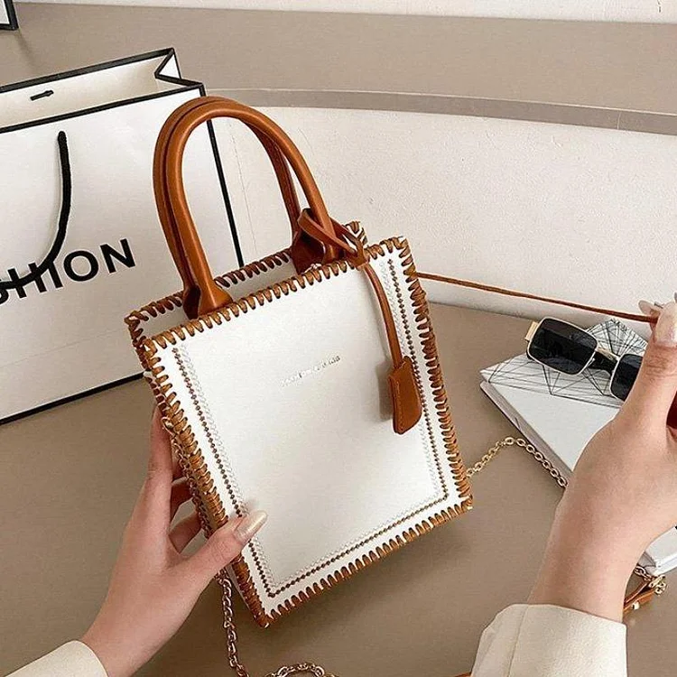 Simple Hand-Stitched Handbag With Strap