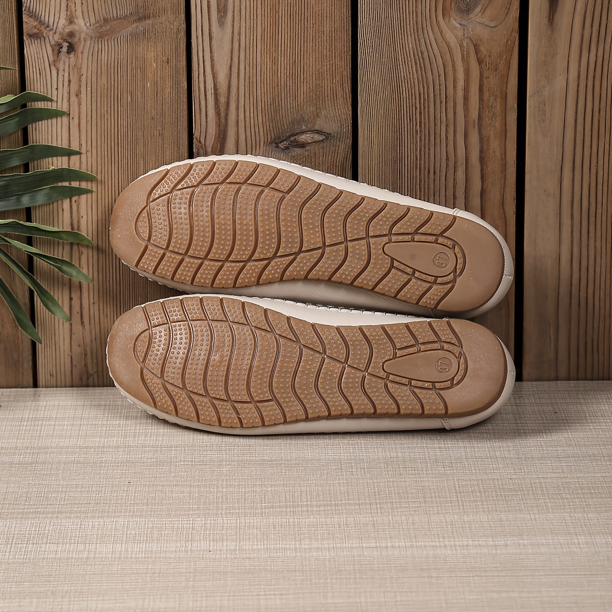 Details of handcrafted leather women's shoes