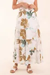Front view of women's ivory and tan floral tiered maxi skirt with flat waistband and A-line silhouette