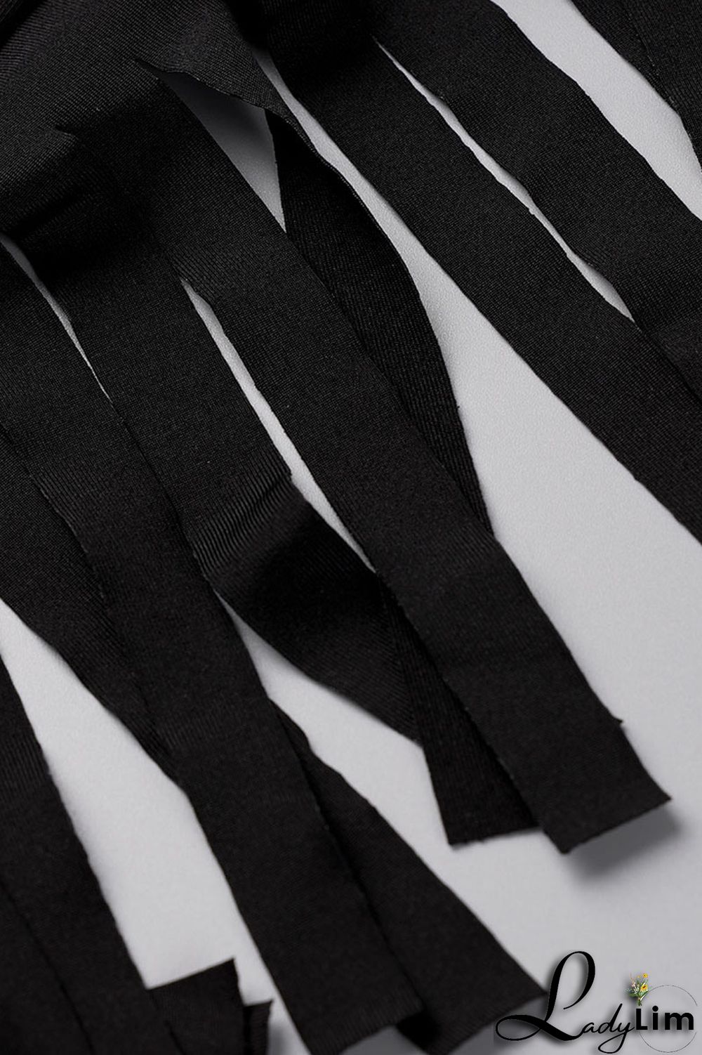 Black Fashion Casual Solid Tassel Patchwork O Neck Sleeveless Two Pieces