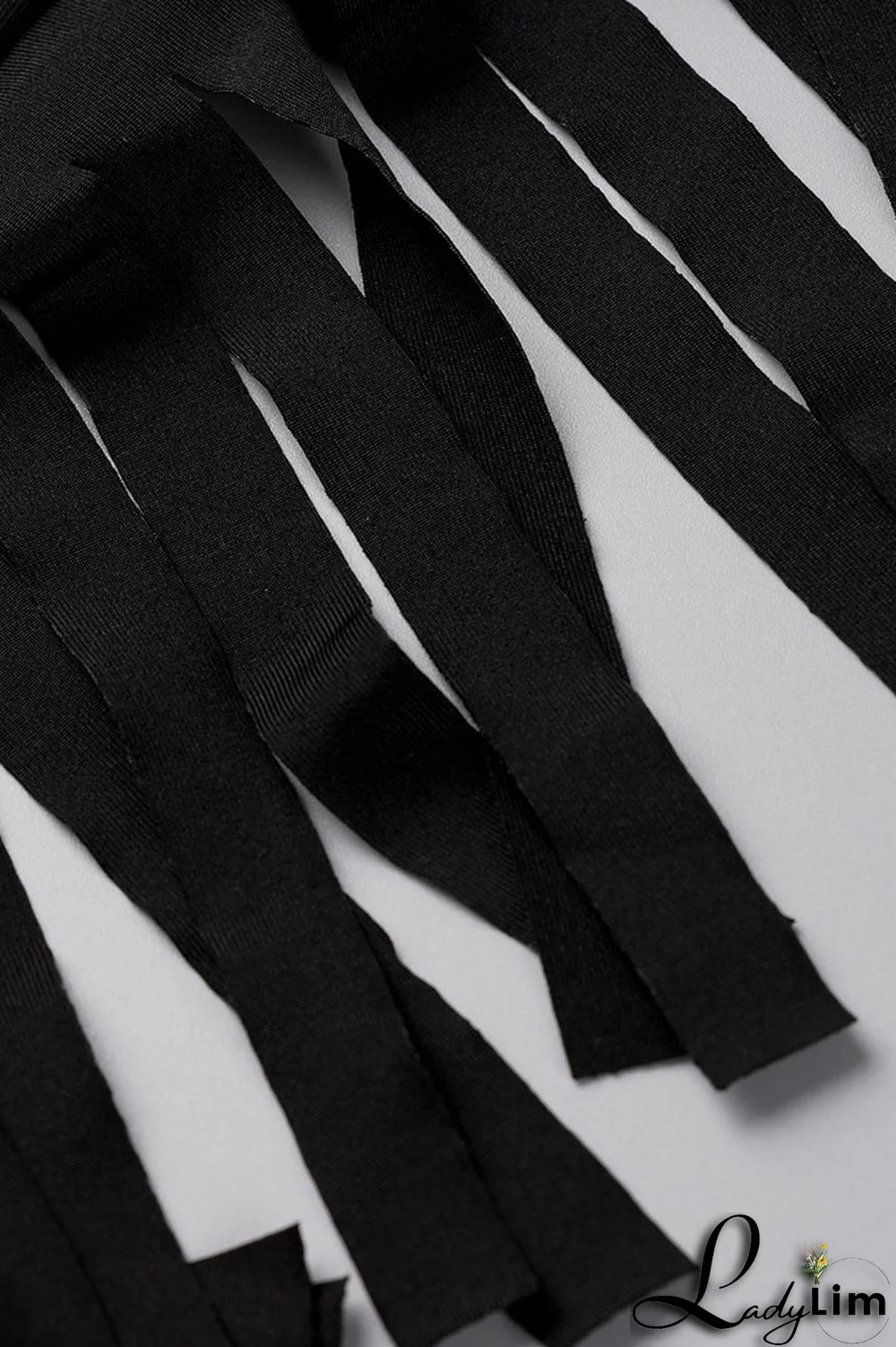 Black Fashion Casual Solid Tassel Patchwork O Neck Sleeveless Two Pieces