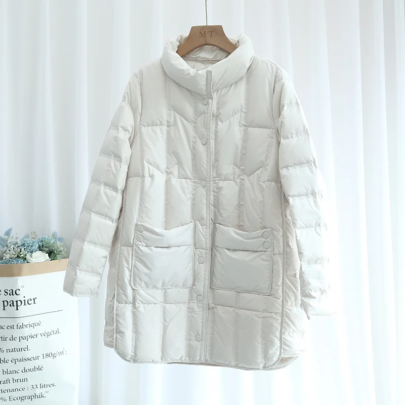 Toloer Autumn Winter New Pressure Glue Down Jacket Female Thin In Long Stand Collar Fashion Hem Open Fork White Duck Down Coat-Outfit Ideas