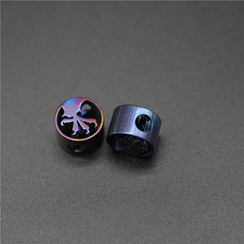 Titanium knife lanyard bead
