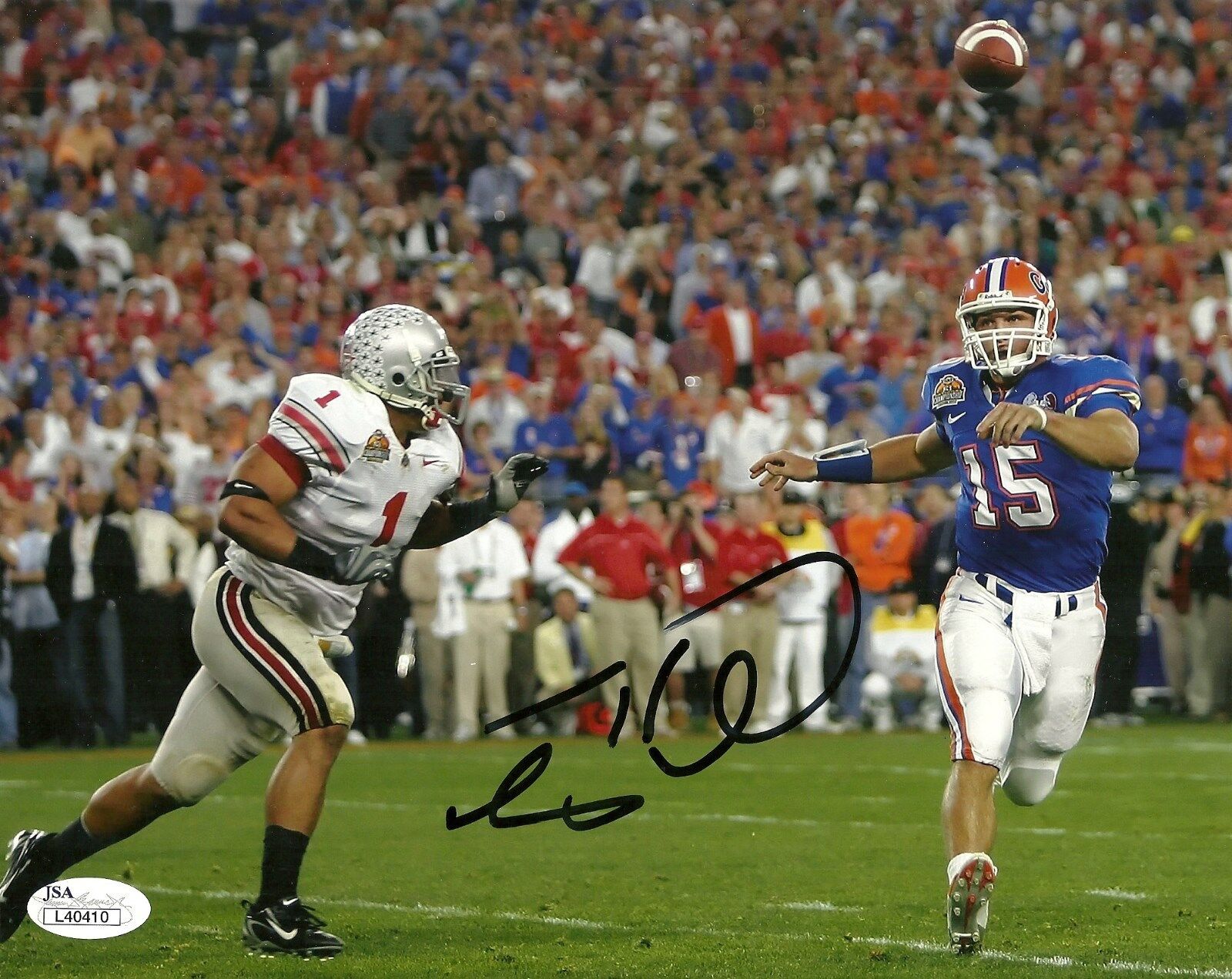 TIM TEBOW SIGNED FLORIDA GATORS NATIONAL CHAMPIONSHIP GAME 8X10 Photo Poster painting W/ JSA COA