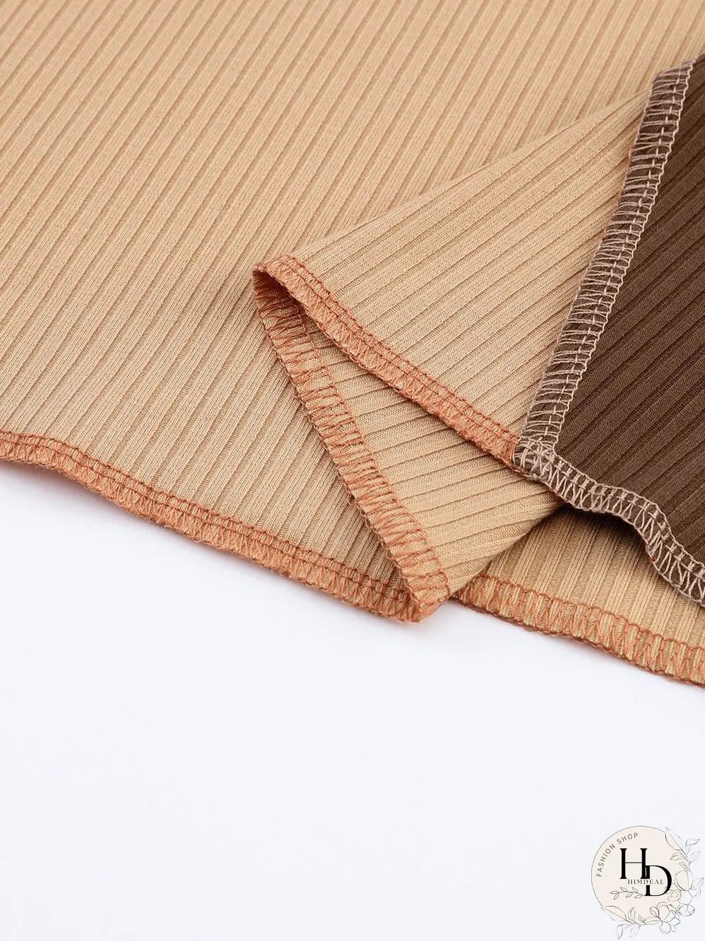 Knit Top with Exposed Seam Detail in Brown Color Block