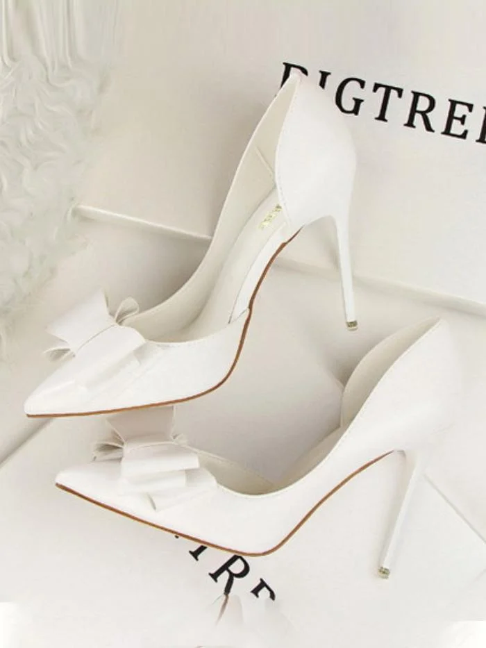 Fashionable bow-knot high-heeled stiletto shoes with shallow mouth and side cutout shoes