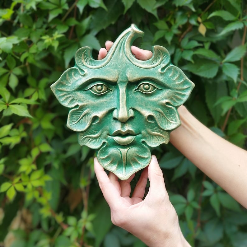 Green Man is a wall art sculpture for home or garden decor. A wonderful spring gift for mythology enthusiasts, gardening and plant lovers. Green+Gold