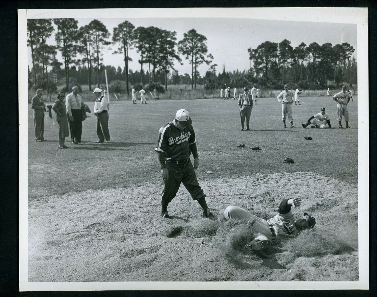 Brooklyn Dodgers sliding practice Vero Beach 1949 Press Photo Poster painting Branch Rickey Jr.