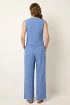 Back view of sleeveless sky blue vest and trousers set showing professional fit and clean silhouette
