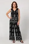 Front view of black and white ethnic print two-piece set featuring sleeveless V-neck top and wide-leg trousers